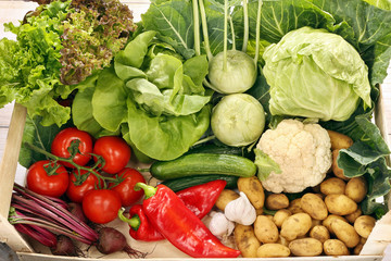 Fresh vegetables in a wooden box