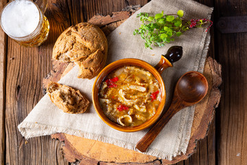 Spicy tripe soup with red paprika.