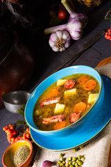 polish pea soup (grochowka) with smoked bacon and sausage