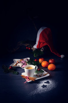 Hot chocolate with colorful christmas biscuits