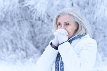 Close up portrait of sad beautiful senior woman