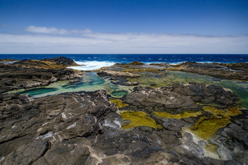 Los Charcones area with beautiful green and blue pools of sea water