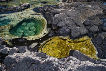 Los Charcones area with beautiful green and blue pools of sea water