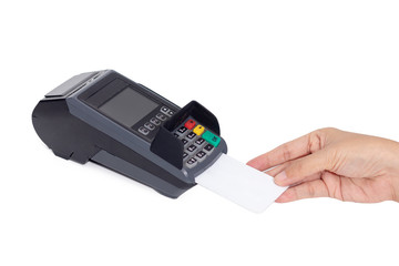 credit card payment concept. close-up hand insert credit card mock up with white blank card with a card swipe machine terminal isolated on white background with clipping path