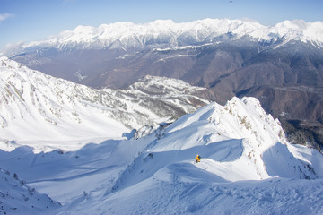 Lines of velveteen fresh ski slopes on Mount Rosa Khutor in Krasnaya Polyana