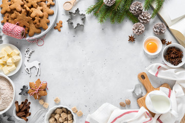 Christmas or Xmas baking culinary background. Ingredients for cooking on kitchen table. New Year or Noel holiday festive decorations, copy space