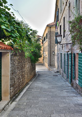 Narrow tourist street in the old town in Herceg Novi, Montenegro