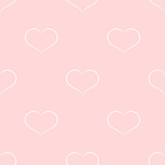 The seamless pattern with white hearts is isolated on the pink background.