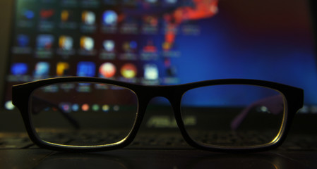 glasses on blue background