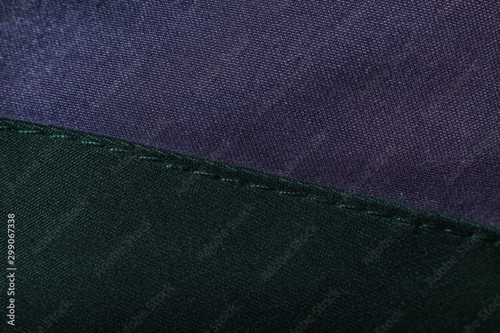 Aufkleber close up beautiful purple and black textile cloth texture background with stitching. macro photograp