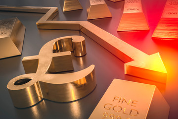 Golden pound symbol and arrow down - pound money fall concept