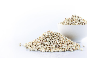 pile job's tear and white bowl on white background.