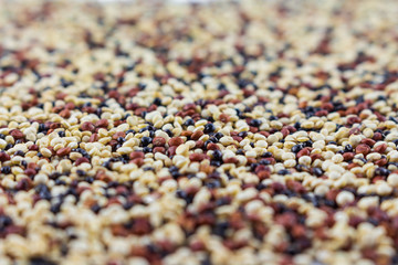 pile quinoa on texture background.