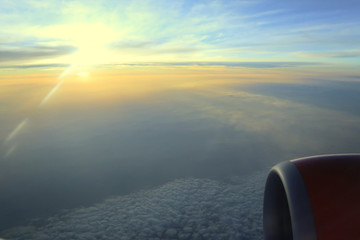 view from an airplane above the clouds