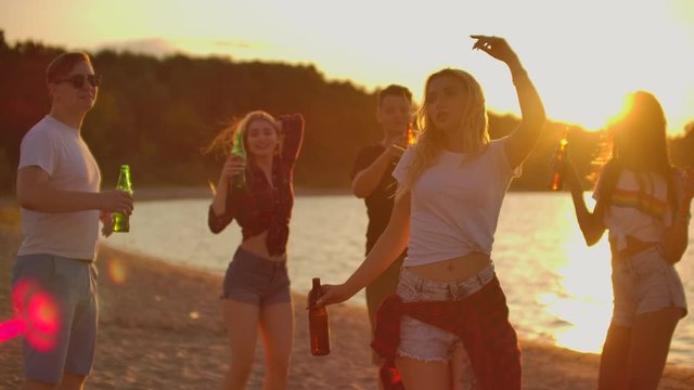 Crazy summer evening party on the beach