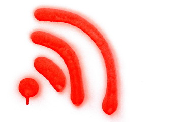 Red spray painted, stained graffiti wifi signal symbol isolated on white background, clipping path © dule964