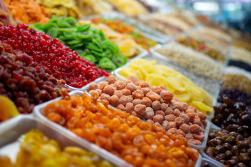 dried fruits, nuts and candied fruits on the market