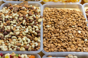 dried fruits, nuts (pistachios) and candied fruits on the market