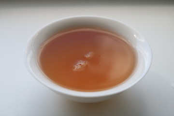 Chinese tea ceremony using tea utensils made of glass, clay and porcelain.