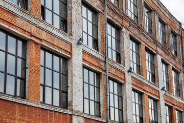Fototapeta premium brick old building with windows