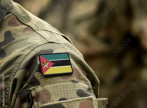 Flag of Mozambique  on military uniform. Army, troops, soldiers. Collage.