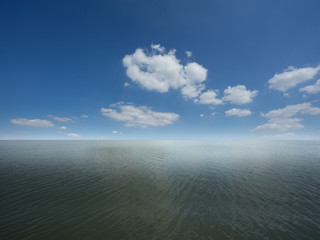 Calm Sea Ocean And Blue Sky Background