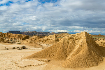 Clay eroded rock on the white ground in the Spanish desert Bardenas Reales