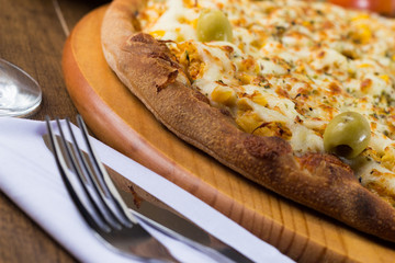 Pizza Chicken flavor with Catupiry. Made with Mozzarella, Chicken, Creamy Curd, Green Olives, Corn...