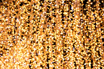 New Year lights abstract photo. Blurred lights on background. Christmas garland