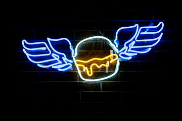 Glowing Neon stylized winged burger