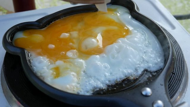 Rube Goldberg Machine. The Egg Is Fried In A Pan