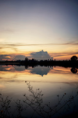Beautiful sunset sky with reflection on the lake