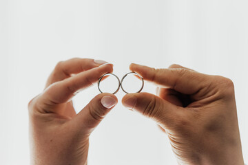 close up on wedding rings, and white background