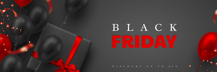 Fototapeta premium Black Friday sale banner. Red and black realistic glossy balloons, gift box and glitter confetti. Black background. Vector illustration.