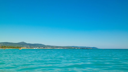 Blue water of Tyrrhenian sea in Vada, Tuscany, Italy.