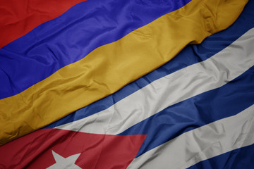 waving colorful flag of cuba and national flag of armenia.