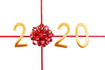 2020 golden numbers, red gift bow and ribbon isolated on white, new year and christmas card