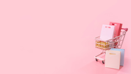 Annual sale shopping season concept - mini pink shop cart trolley full of paper bag gift isolated on pale pink background, blank copy space, close up