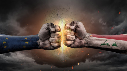 EU vs Iraq. Fists with flags. Battle EU with Iraq on sky.
