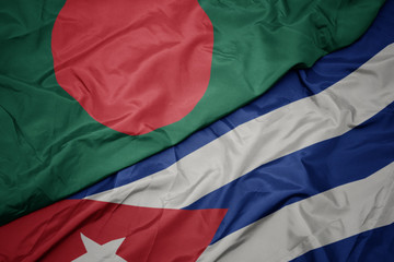 waving colorful flag of cuba and national flag of bangladesh.