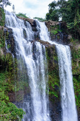 Fototapeta na wymiar Close up image of Tad Yuang Waterfall, The beautiful waterfall at Champasak, southern Laos.