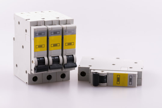 Four 6 amp miniature circuit breakers