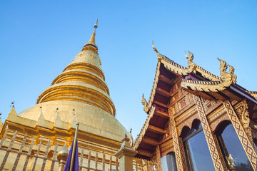 Fototapeta premium Wat Phra That Hariphunchai,Lamphun Province,Thailand,beautiful golden pagoda Lanna style