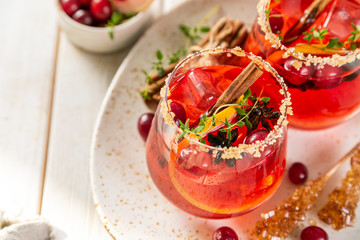 Thanksgiving cocktail - cranberry, cimmanon, grapefruit punch copy space