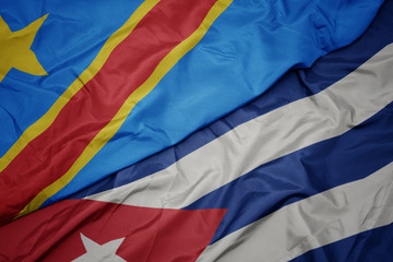 waving colorful flag of cuba and national flag of democratic republic of the congo.