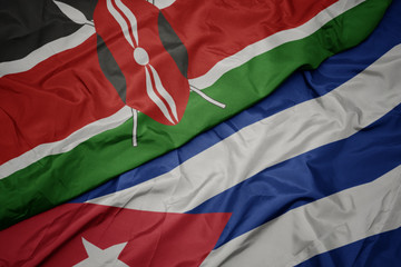 waving colorful flag of cuba and national flag of kenya.