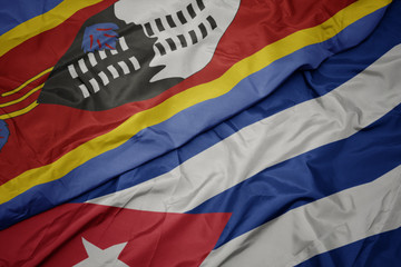 waving colorful flag of cuba and national flag of swaziland.
