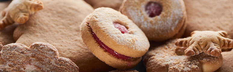 close up view of delicious baked Christmas cookies, panoramic shot