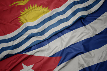 waving colorful flag of cuba and national flag of Kiribati .