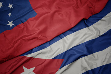 waving colorful flag of cuba and national flag of Samoa .